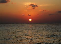 This sunset was taken off of our balcony in Cozumel. Cano... by Garry Rogers 